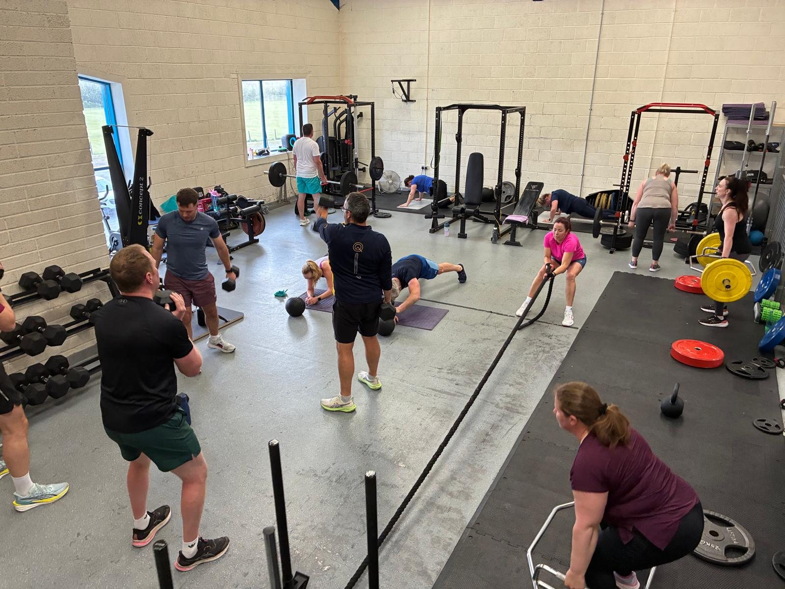 A strength and conditioning class in progress at OS Clinic